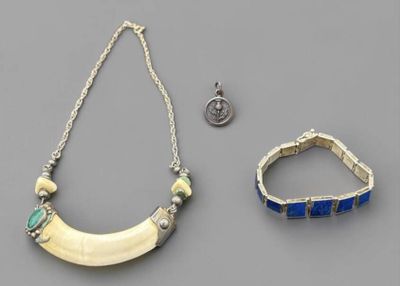 two pieces of jewelry including a necklace, bracelet, and ring