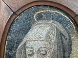 a picture of a painting of a woman on a wall