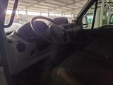 a view of the inside of a vehicle from the driver ' s seat
