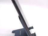 a close up of a cell phone on a stand