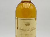 an image of a bottle of wine sitting on top of a table