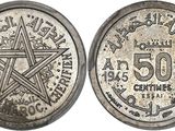 a close up of a coin with a pentagram on it