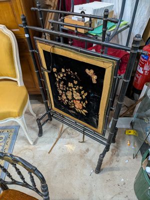 a picture of a chair and a table in a room