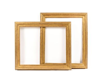 two gold frames on a white background with a white background