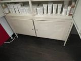 a cabinet with a lot of cosmetic products on it