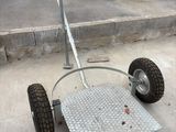a small cart that is sitting on the ground