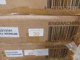 a stack of boxes sitting on top of each other on the floor