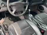 a car with a steering wheel and a dash board