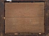 a picture of a wooden frame with a sign on it