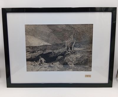 une photo d'une girafe couchée dans la terre
