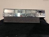 an image of a remote control sitting on top of a table