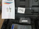 a black case with a digital meter in it