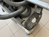 an image of a vacuum with a hose attached to it