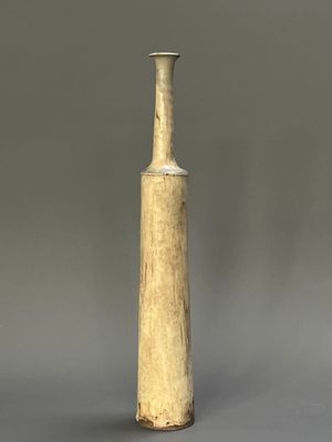 a small vase that is sitting on a table