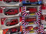a lot of toy cars that are in the boxes