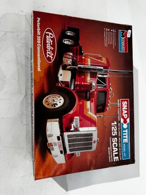 a box with a picture of a semi truck on it