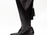 black leather high heel boots with tassels on the toes