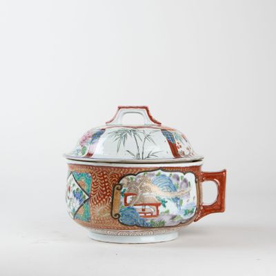 an image of a bowl with a lid on a white surface