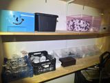 a shelf that has many containers and containers on it