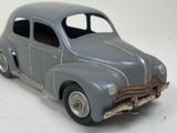 a toy car that is sitting on a white surface