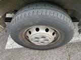 a close up of a flat tire on a truck
