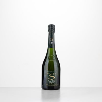 a bottle of champagne sitting on top of a table
