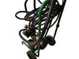 an image of a hand truck with a hose attached to it