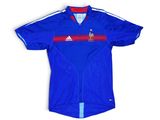 a close up of a blue shirt with a red and white stripe