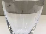 a glass that is sitting on a table