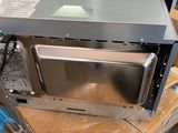 an image of a microwave sitting on top of a box