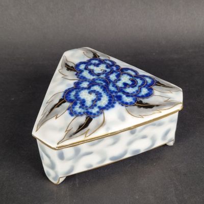 an image of a blue and white box with flowers on it