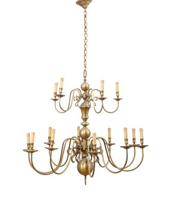 a large brass chandelier with eight arms and eight lights