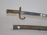 two swords that are on display on the wall