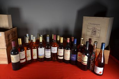 many bottles of wine sitting on a red table cloth
