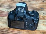 a camera that is sitting on a wooden table