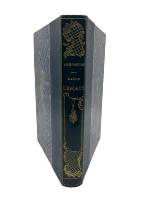 an old book with a black cover and gold writing on it