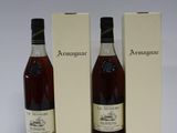 three bottles of wine sitting next to each other on a table