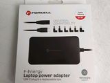 an image of a box with a charger and a cable in it