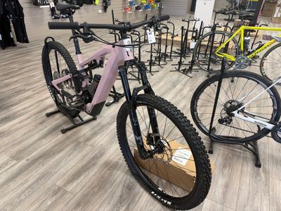 a bike that is sitting on a stand in a store