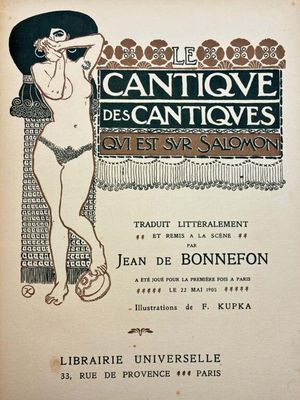 un vieux livre sur lequel figure l'image d'une femme en maillot de bain