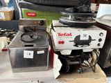 a box that has a stove and a toaster on top of it