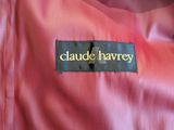 a close up of a label on a pink jacket