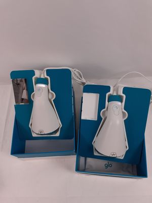 pair of blue and white wireless mouses sitting in a blue box