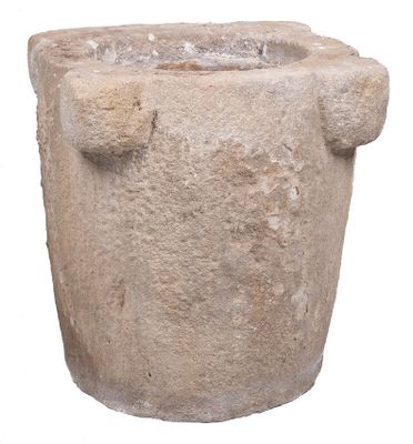 a stone planter with a handle on a white background