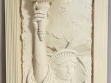 sculpture of statue of liberty holding a torch in her hand
