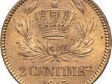 a gold coin with a crown on top of it