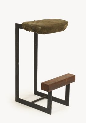 a small stool with a wooden seat next to a small table