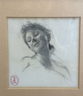 drawing of a woman with her eyes closed in a picture frame