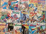 a lot of comic books on the table together