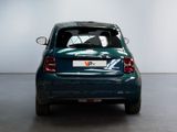 a small car that is parked in a room